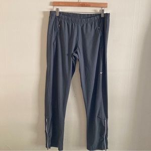 NIKE men’s dri fit gray adjustable waist zipper bottom track pants